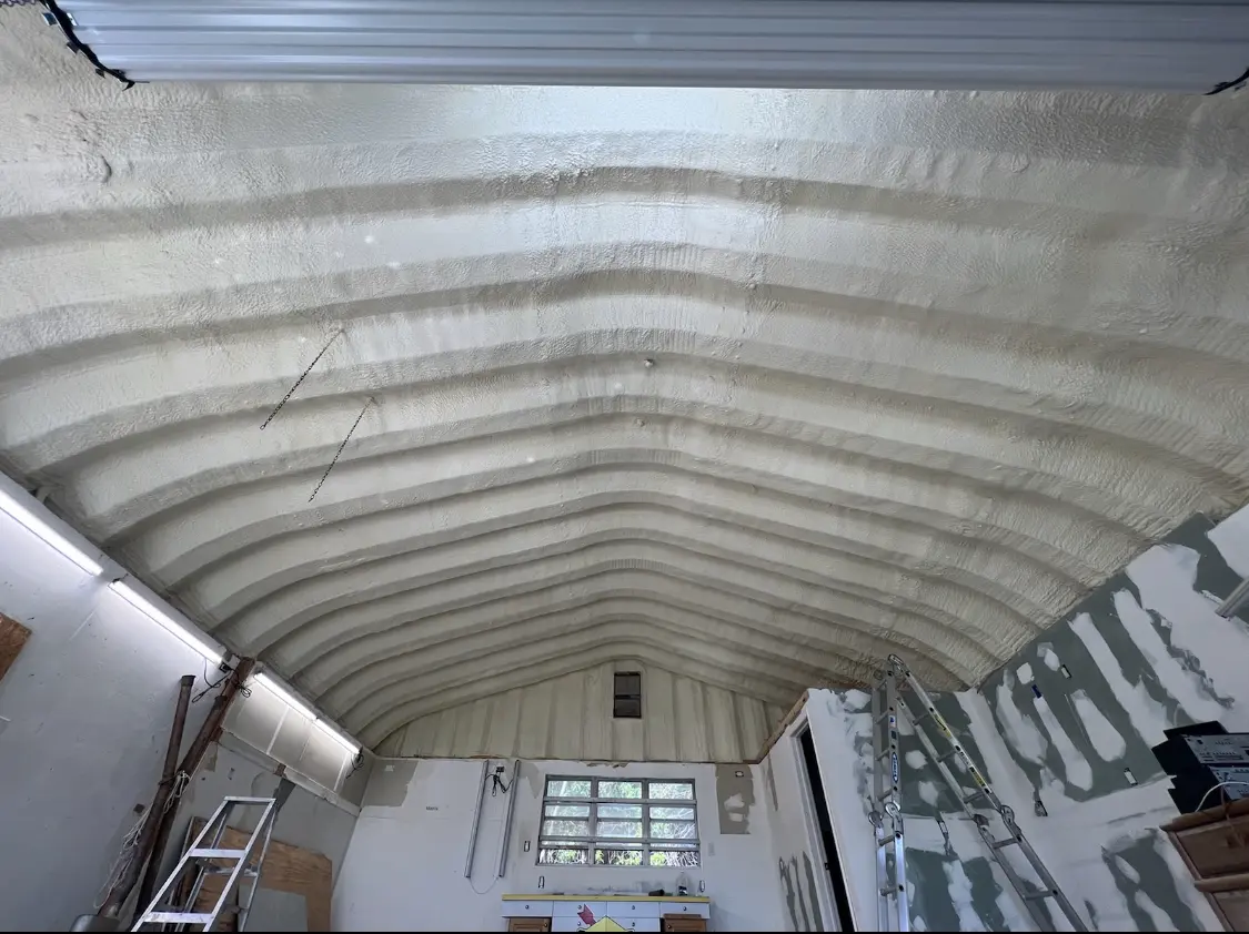 Spray polyurethane foam applied to the underside of a metal roof deck in Tellico Village